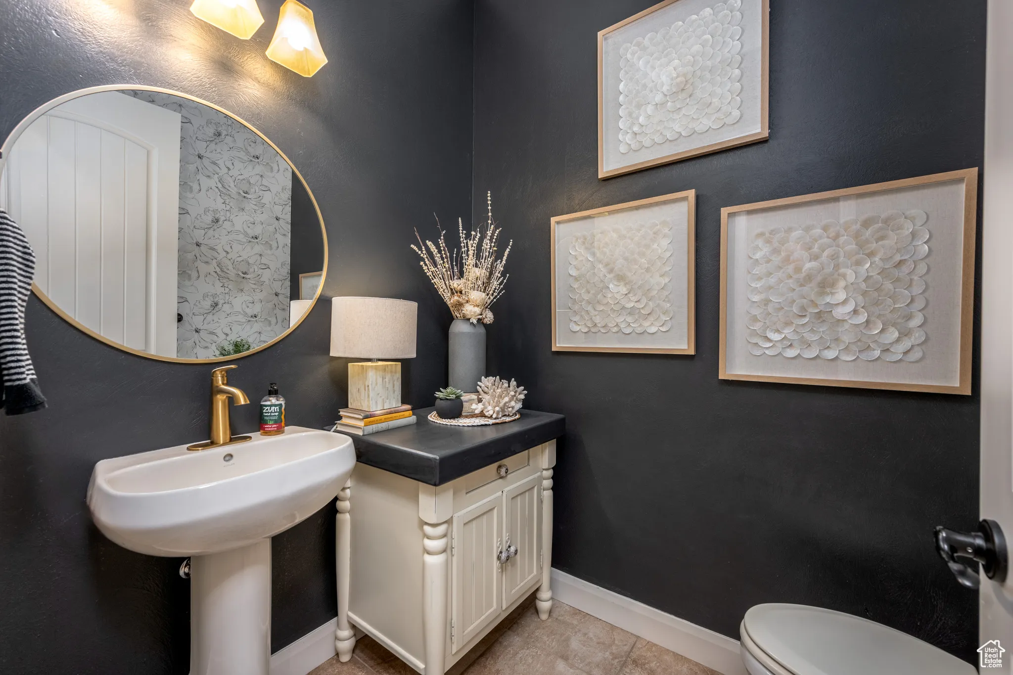 Bathroom with tile patterned floors and toilet