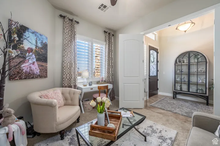 Living room featuring light tile patterned flooring