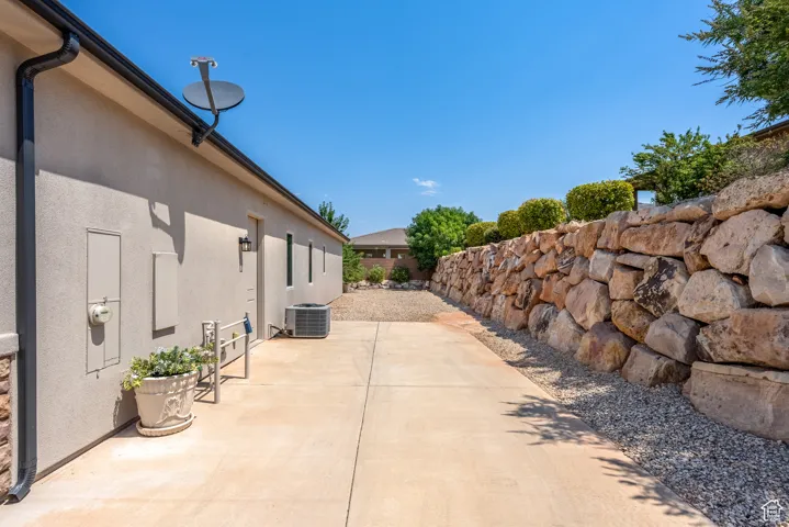 View of patio featuring central AC unit