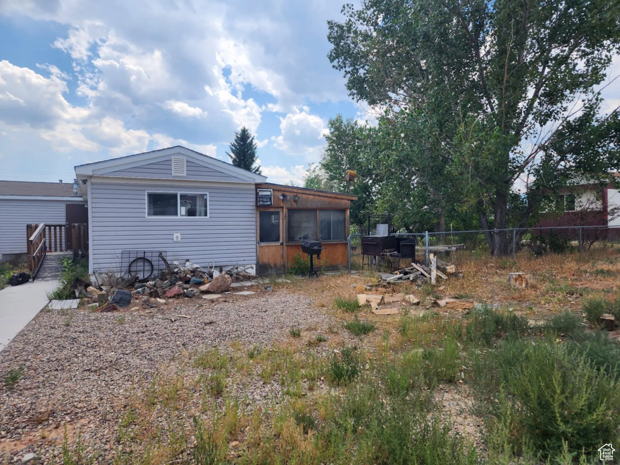 Back of the home and covered patio
