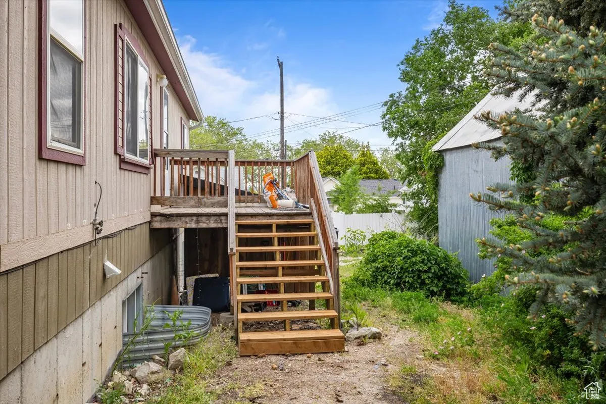 View of yard featuring a deck