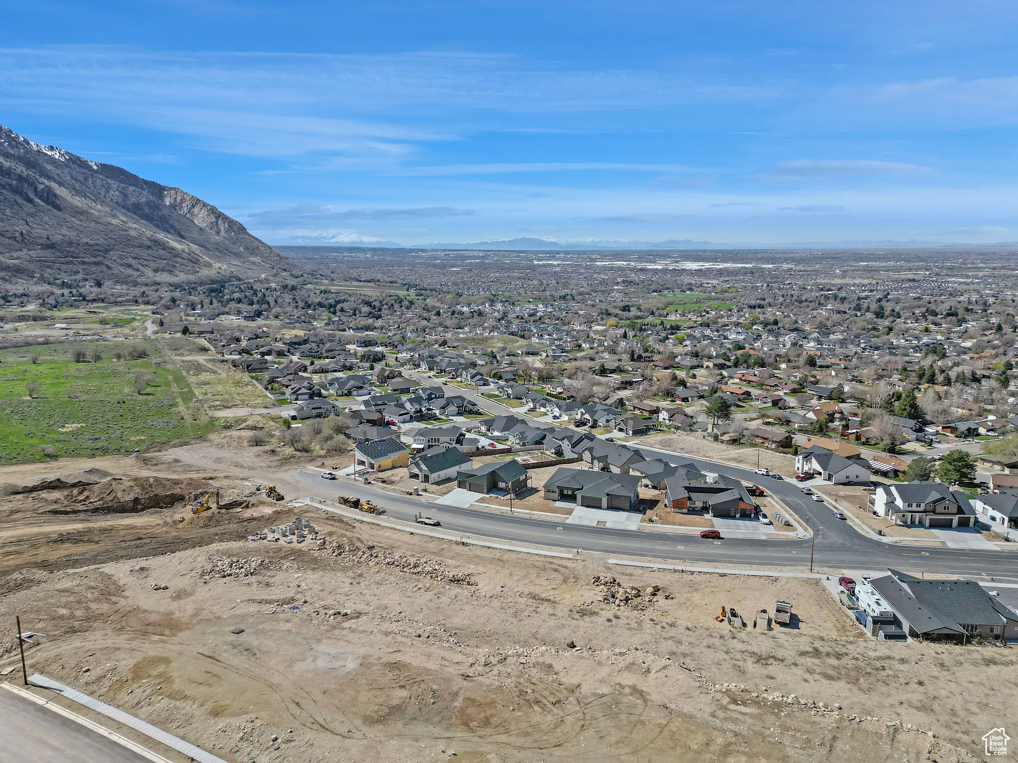 Drone / aerial view featuring a mountain view and a residential view
