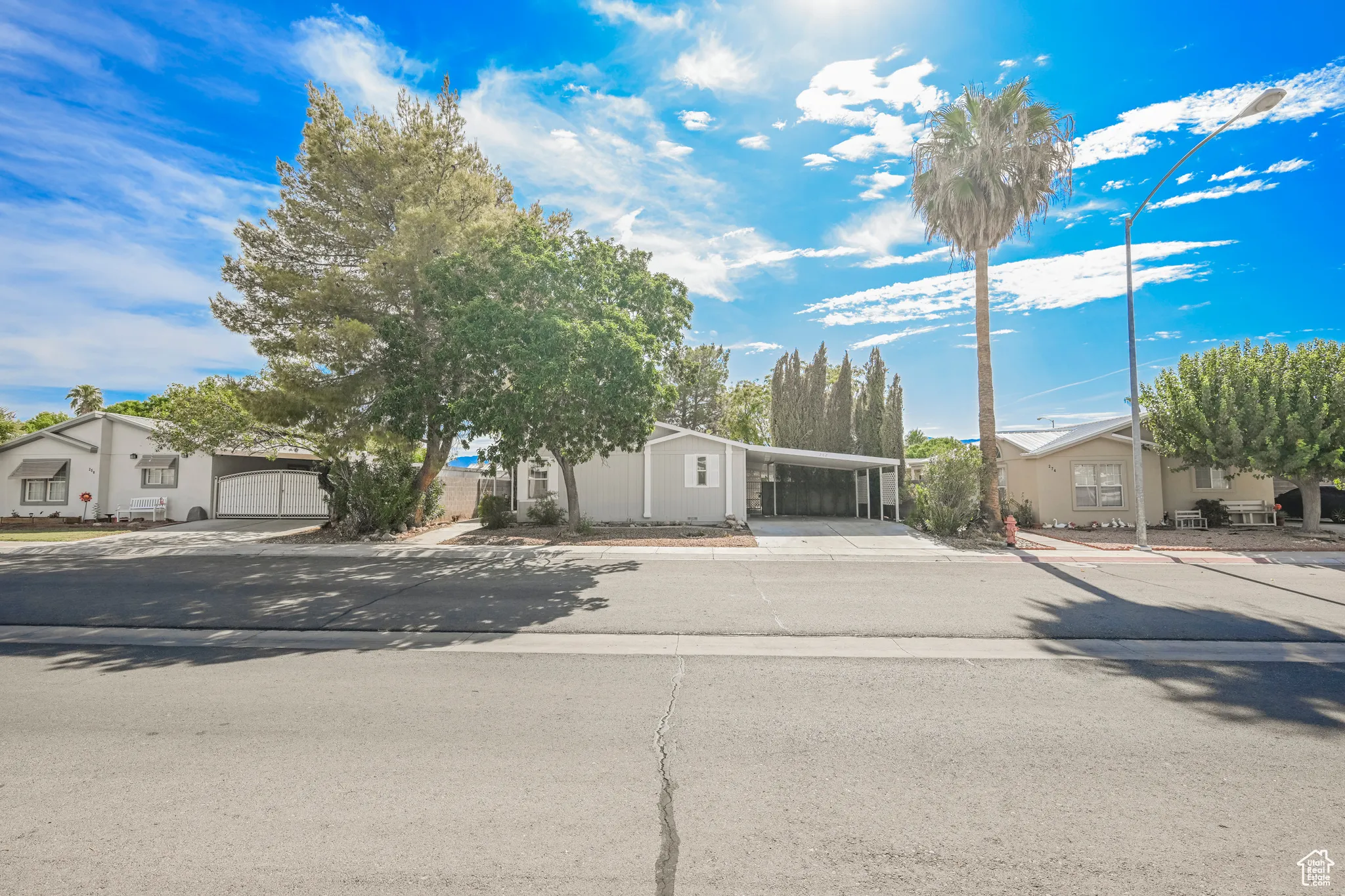 View of front facade featuring a carport
