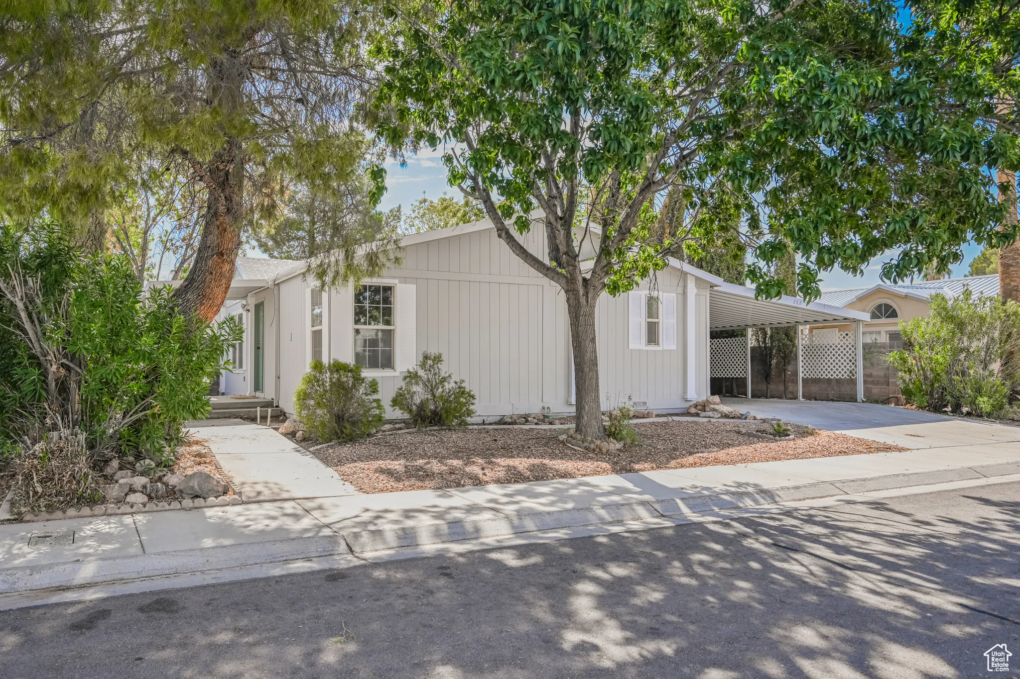 View of front of home with a carport
