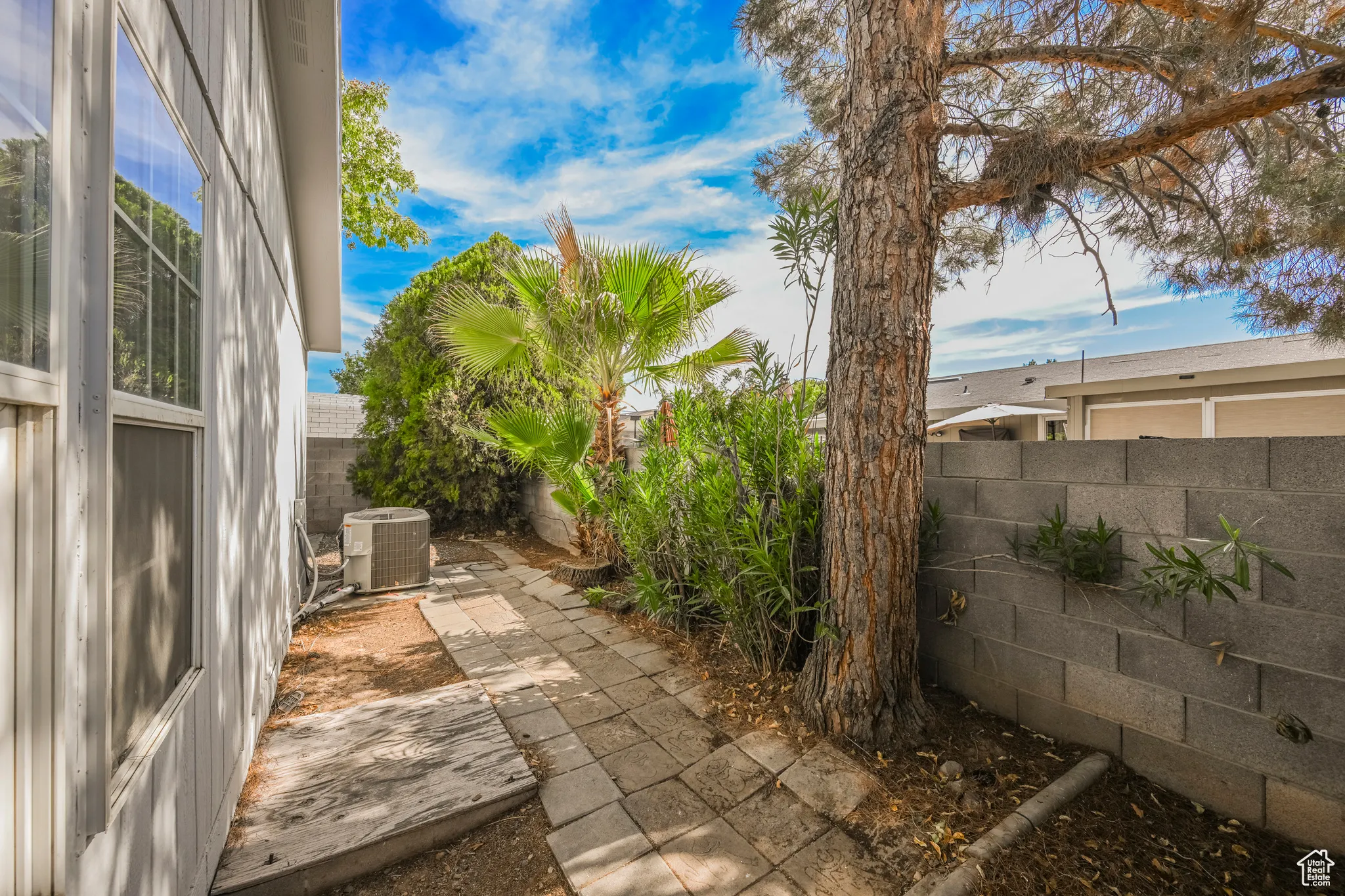 View of patio featuring central AC unit