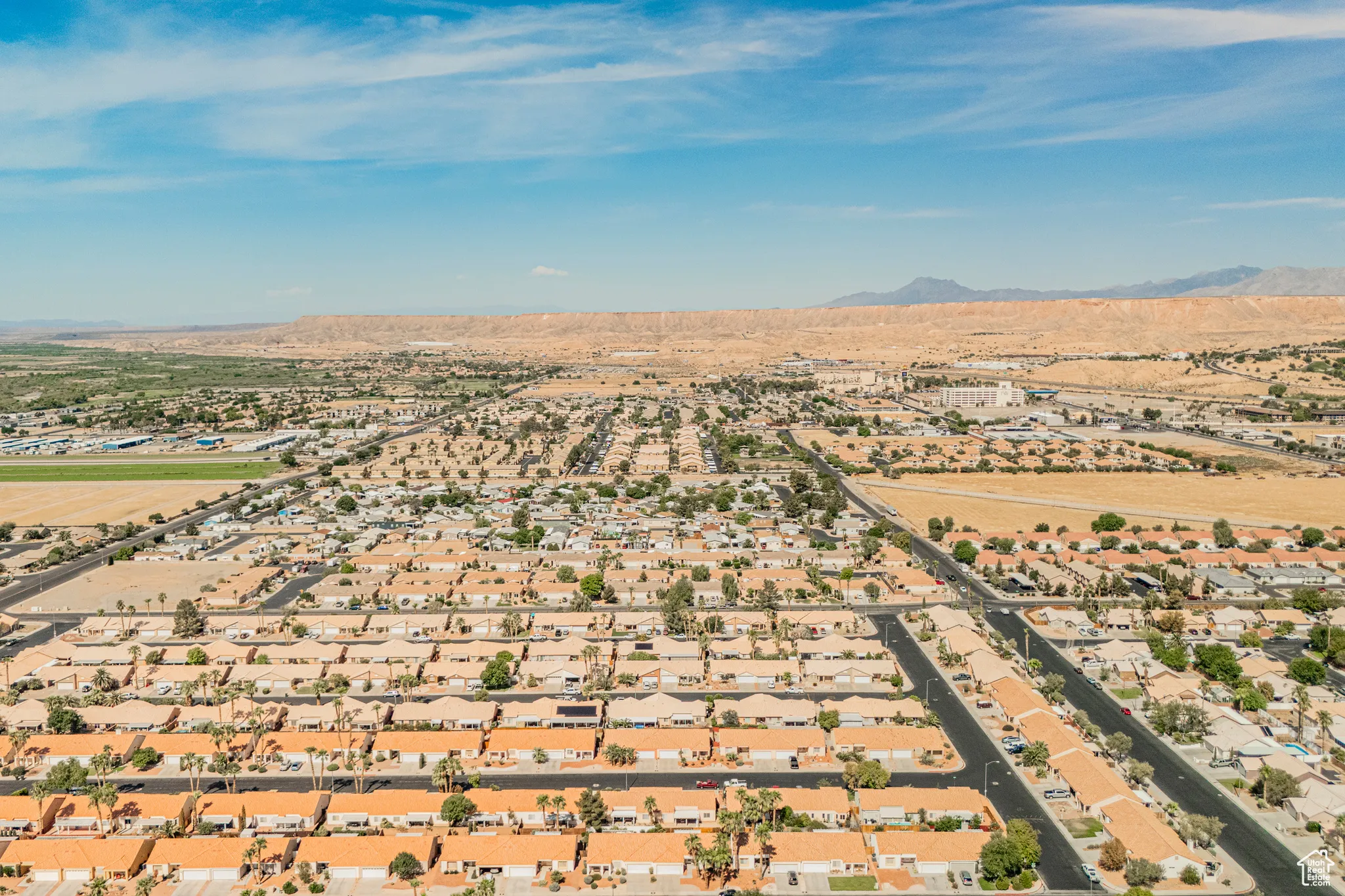 Birds eye view of property with a mountain view