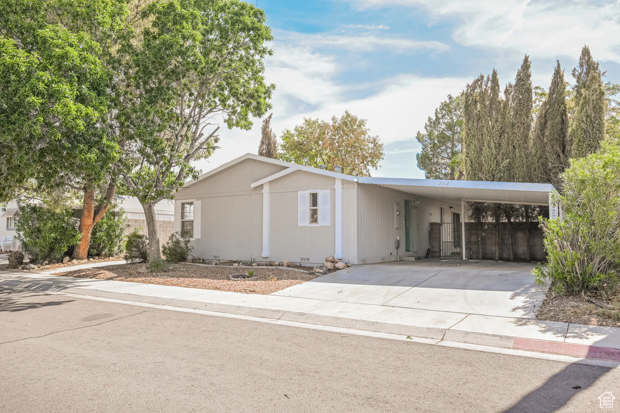 Single story home with a carport