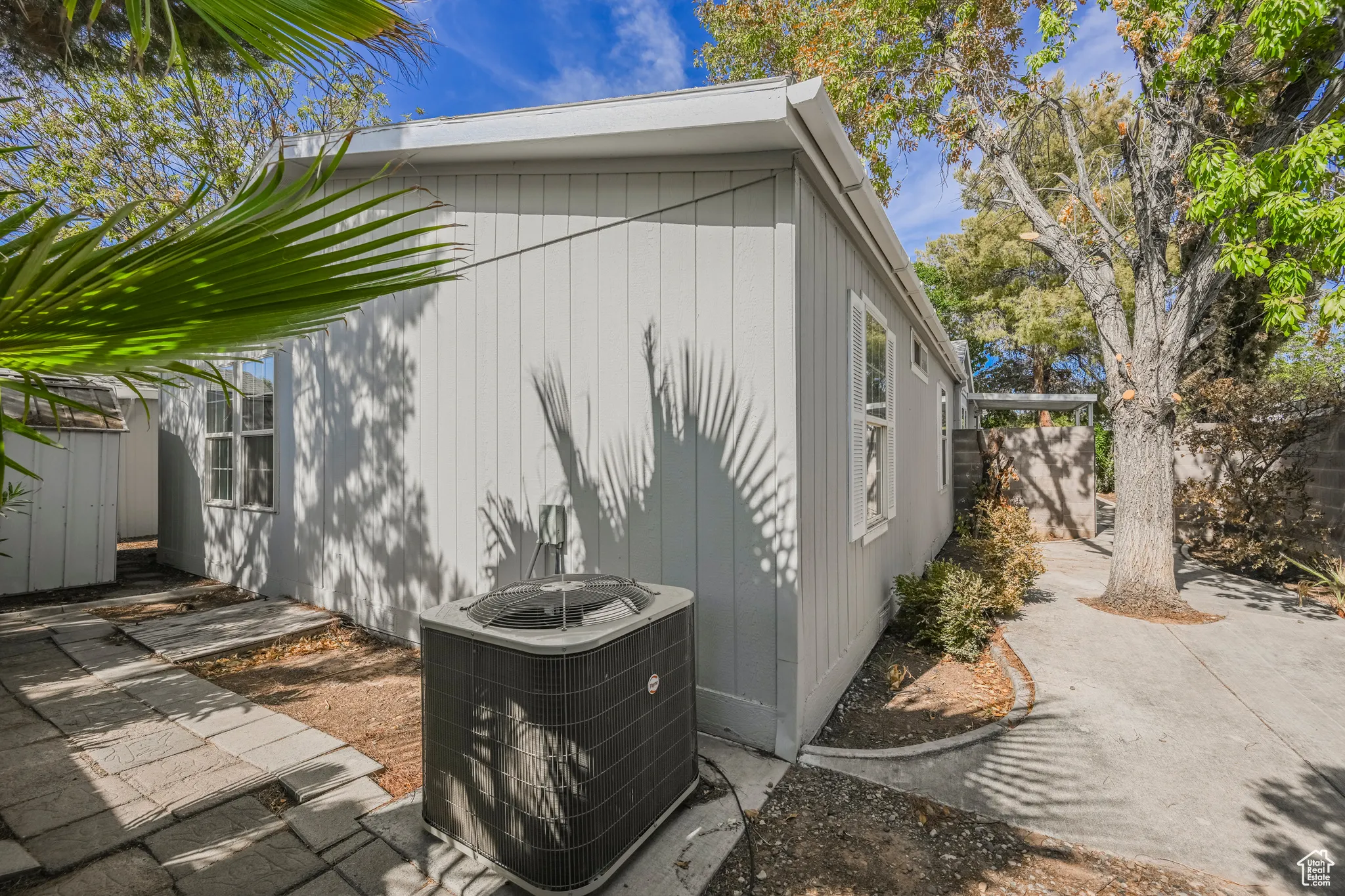 Exterior space featuring cooling unit