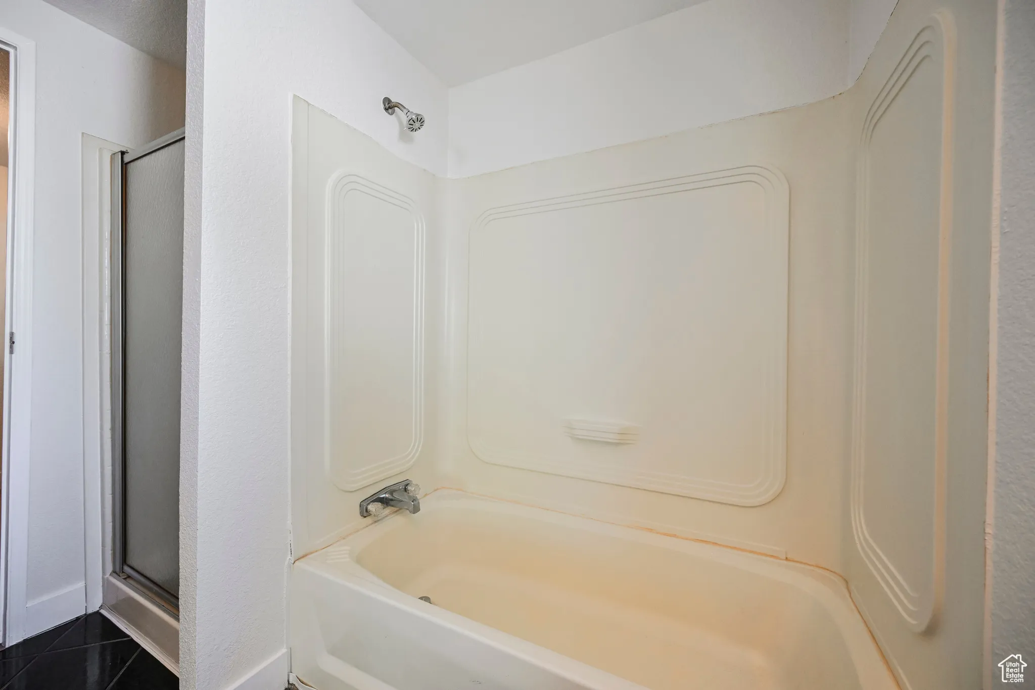 Bathroom with tile patterned flooring