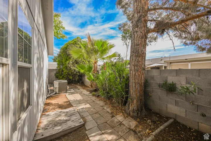 View of patio featuring central AC unit