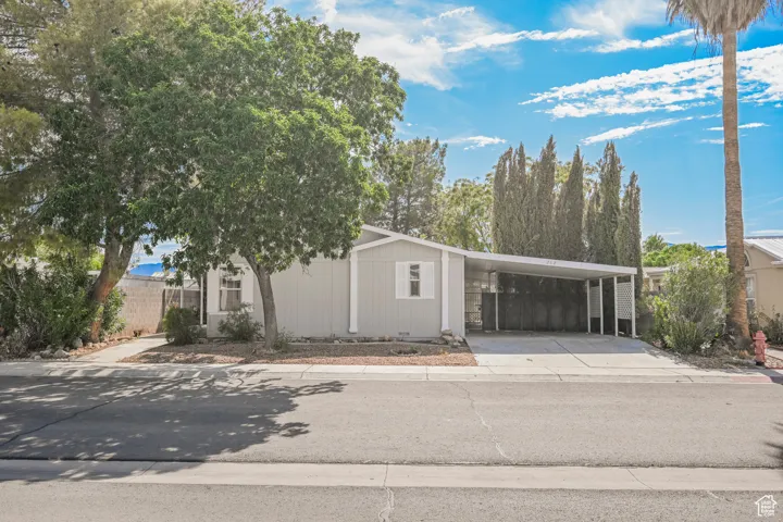 View of front of home featuring a carport