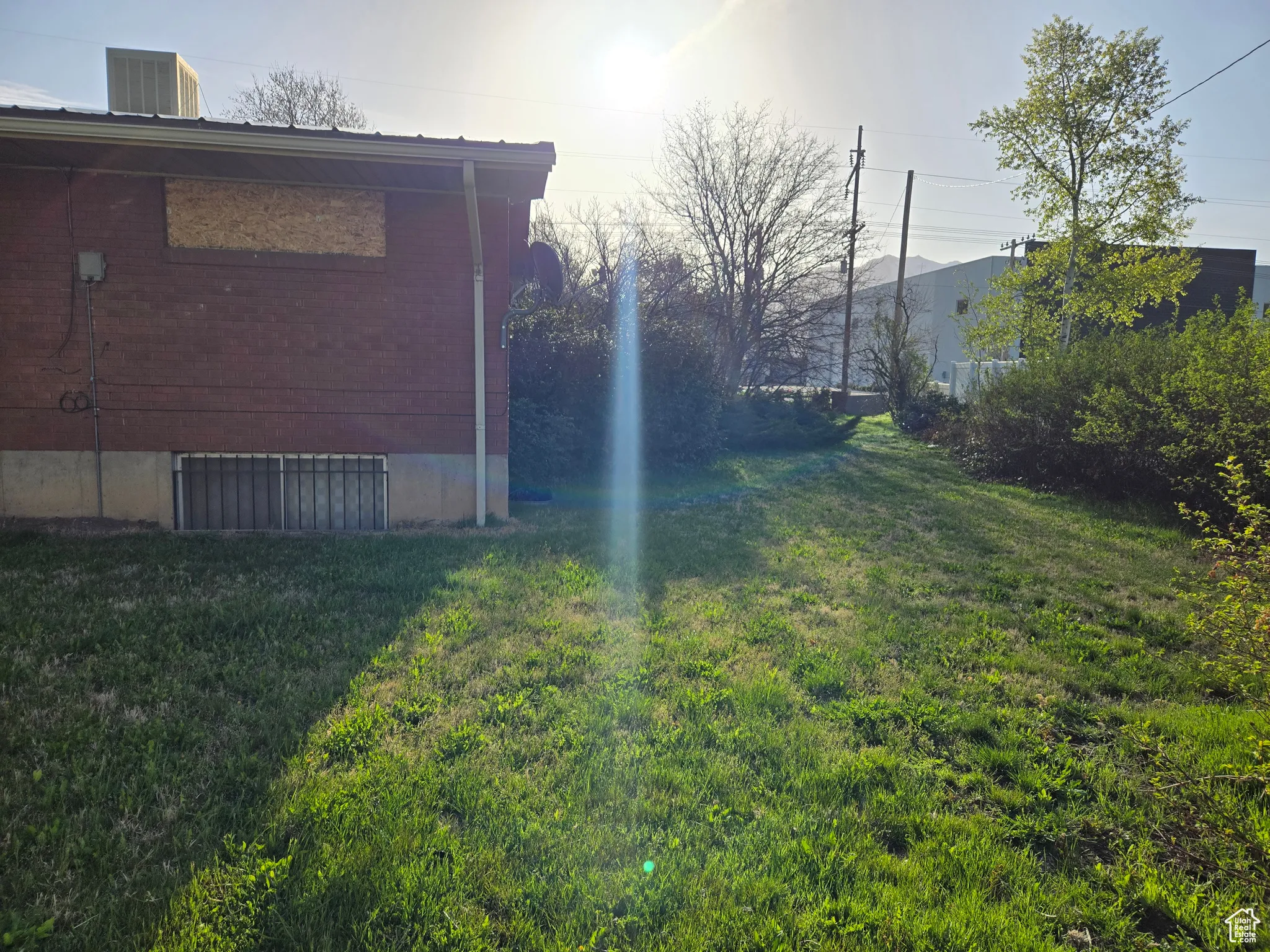 View of yard with cooling unit