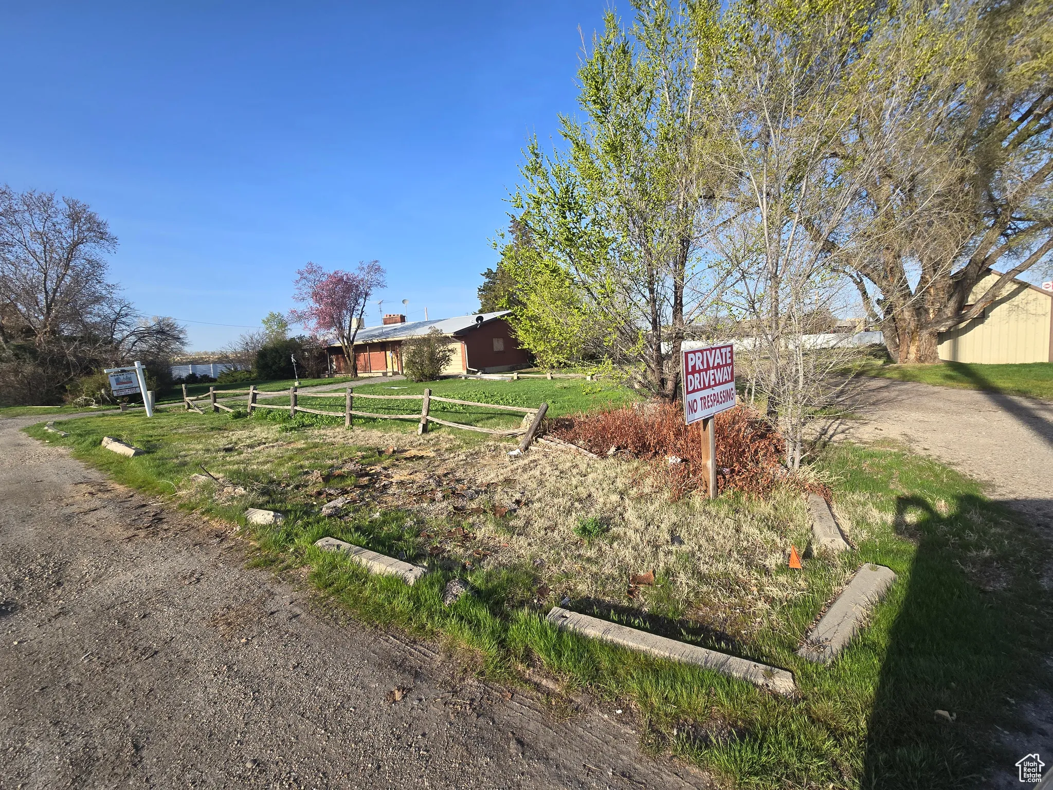 View of yard featuring fence