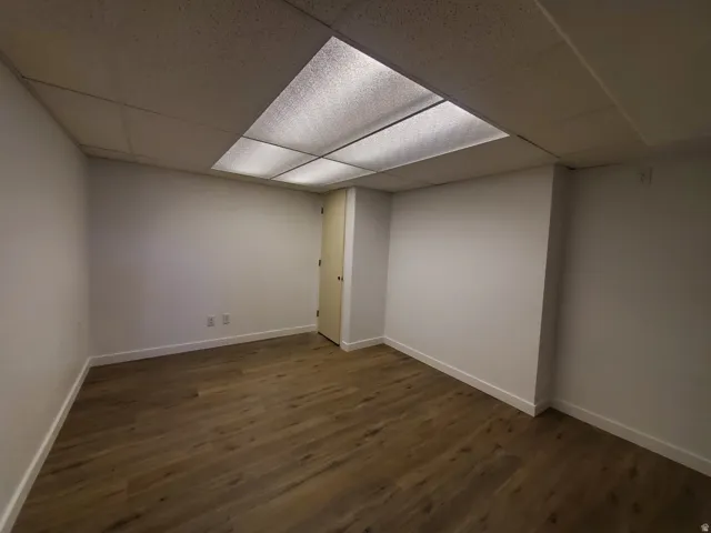 Bedroom #3 in basement with brand new flooring, walls, doors and paint
