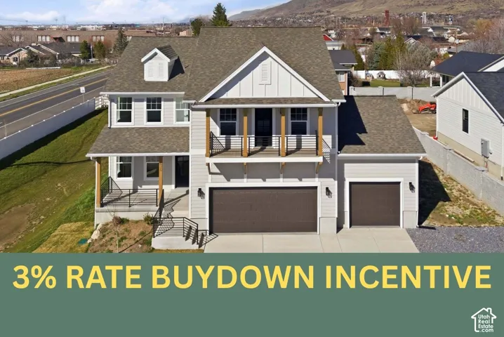Two-story exterior featuring fiber-cement siding, a covered balcony with wood-finish supports and metal railing, a three-car garage configuration, and mountain backdrop