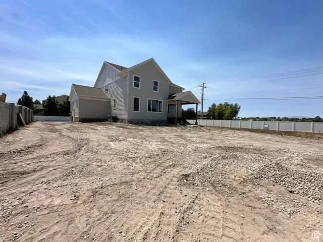Back of property with board and batten siding