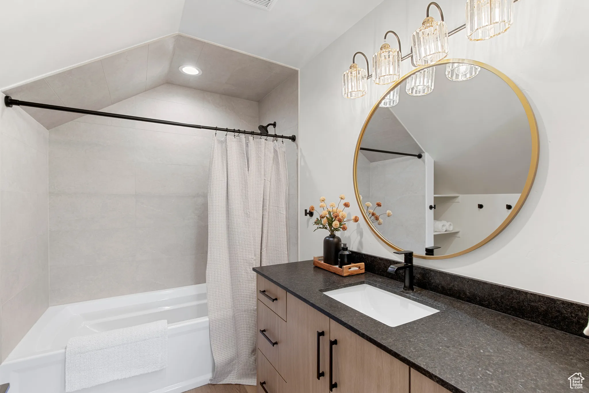 Full bathroom featuring shower / bath combination with curtain, vanity, and recessed lighting