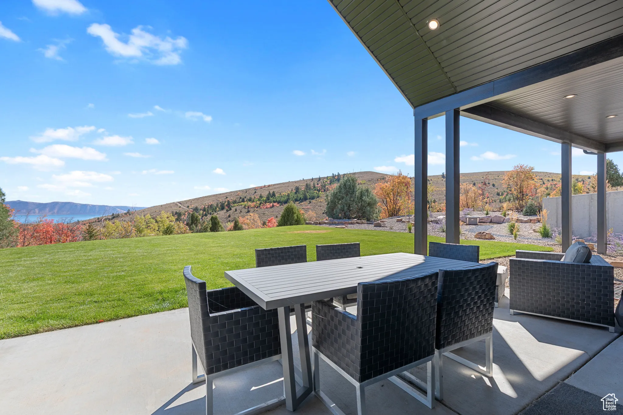 View of patio / terrace with outdoor dining area and a mountain view