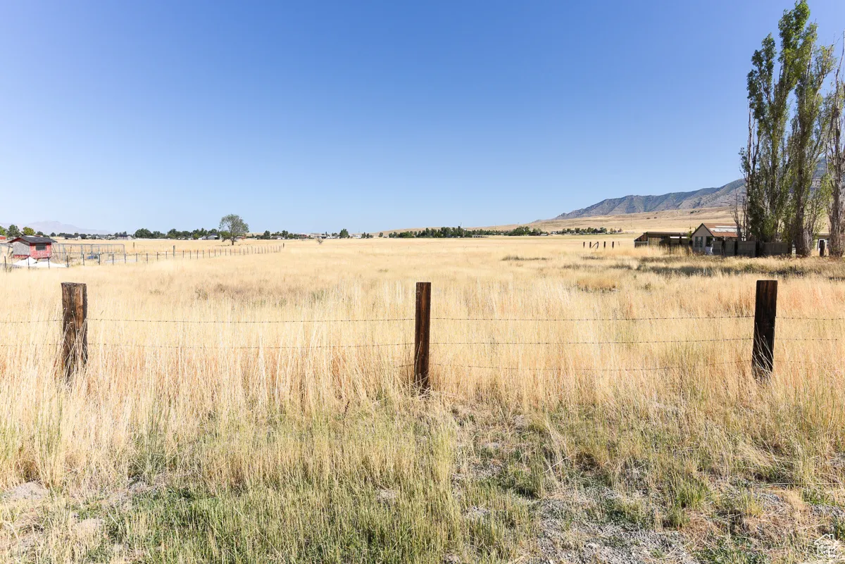 Exterior space with a mountain view and a rural view