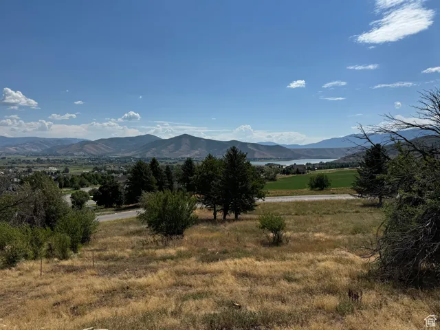 Property view of mountains featuring a rural view