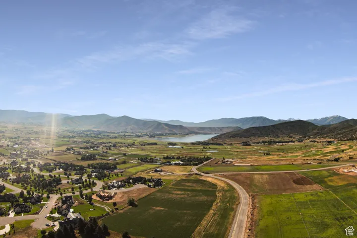 Mountain view featuring a water view