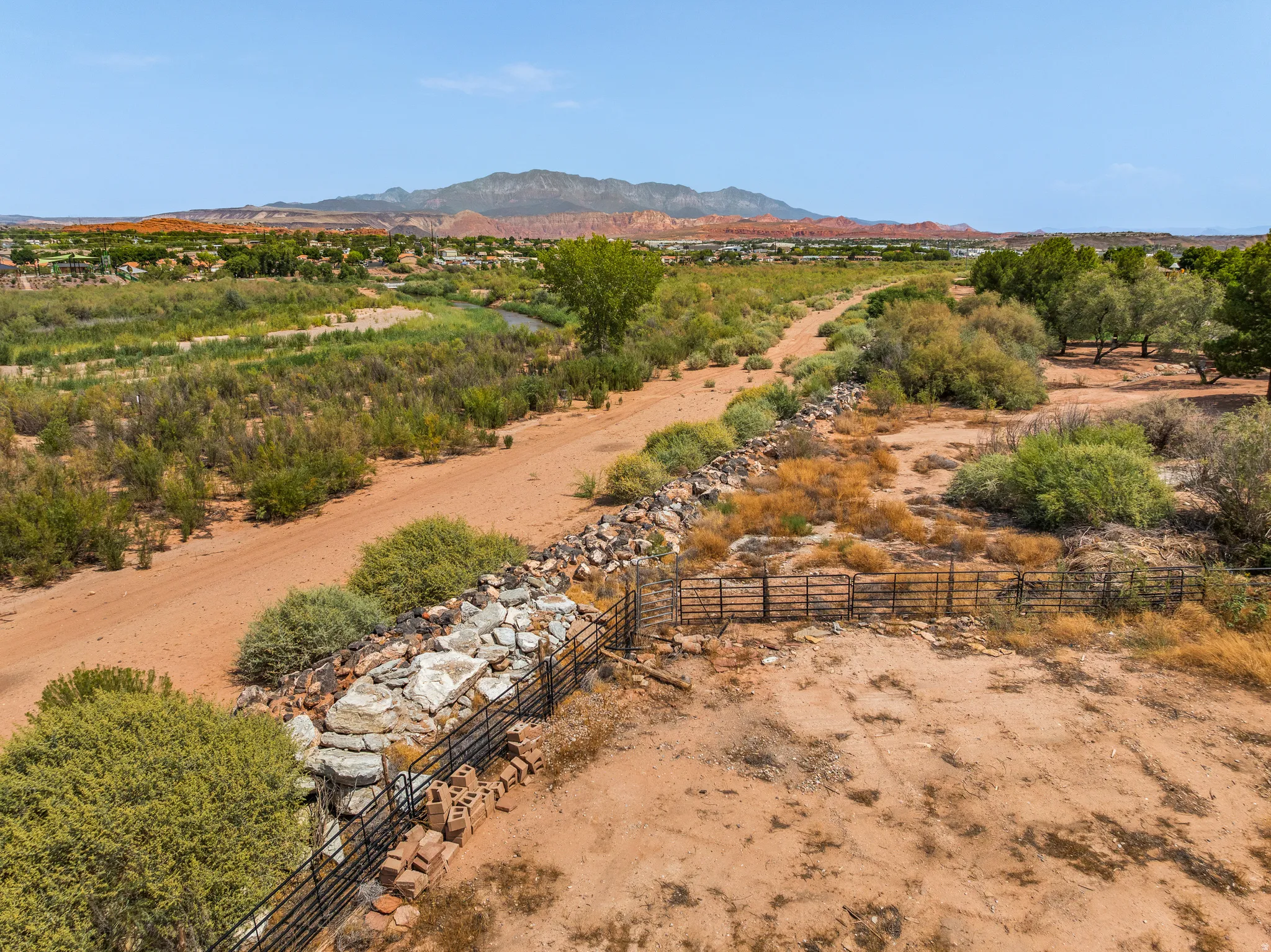The back gate opens straight onto the Virgin River trail system. No trailering, no hauling out.
