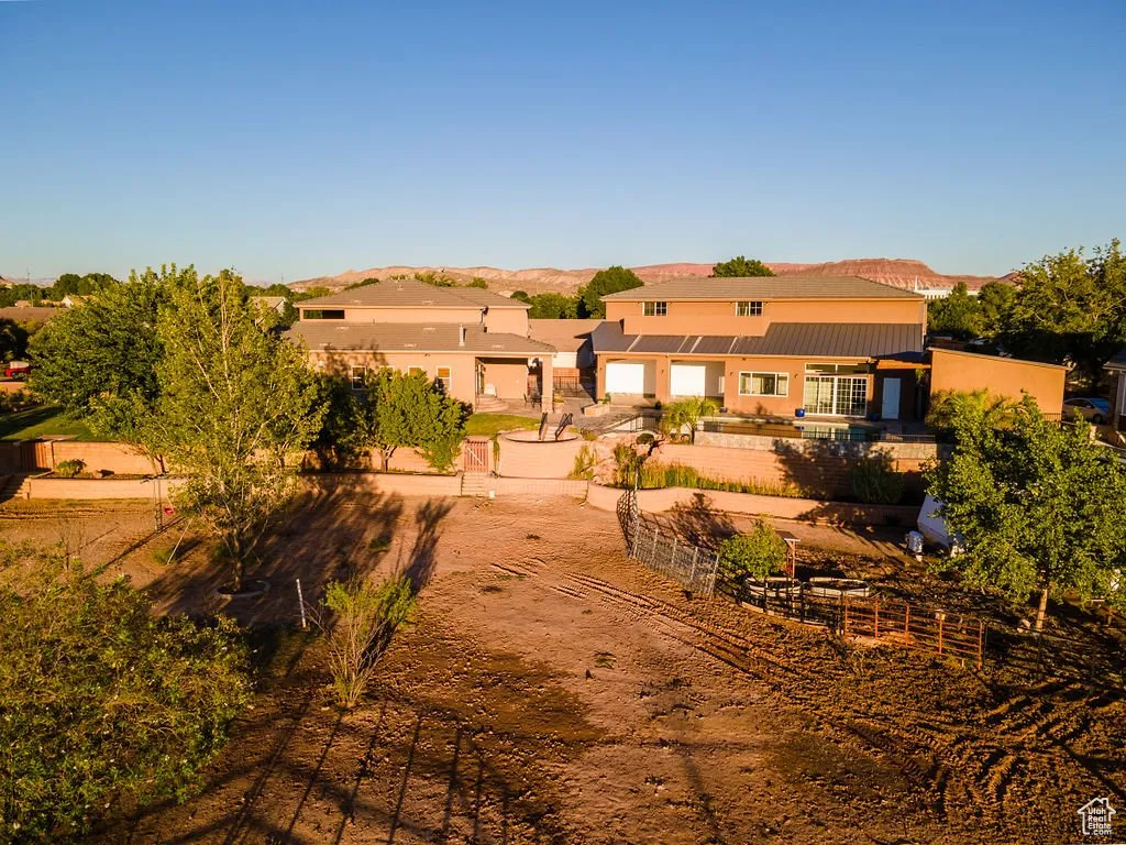 Rear view of house with a mountain view