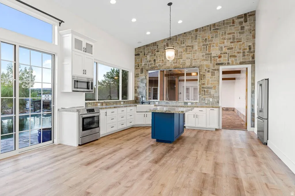 Standalone casita with full kitchen, island, and living area. Guests, extended family, or rental.