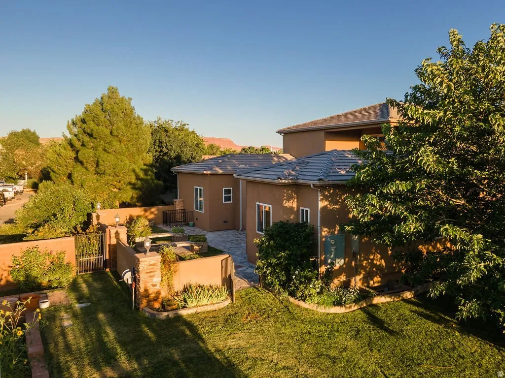 Established landscaping and full shade canopy.