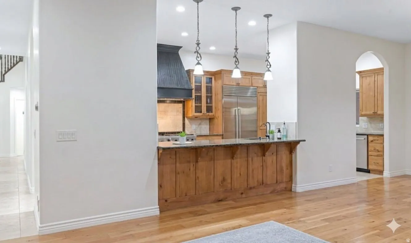 Kitchen opens directly to the living areas — one continuous space.