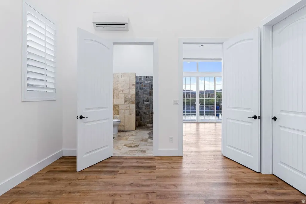 Open floor plan with natural light on both ends.