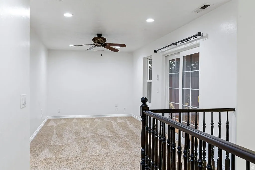 Open landing overlooking the entry below.