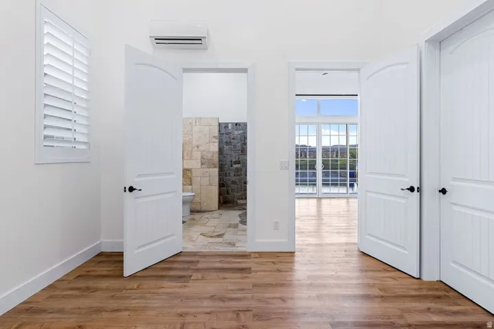 Open floor plan with natural light on both ends.