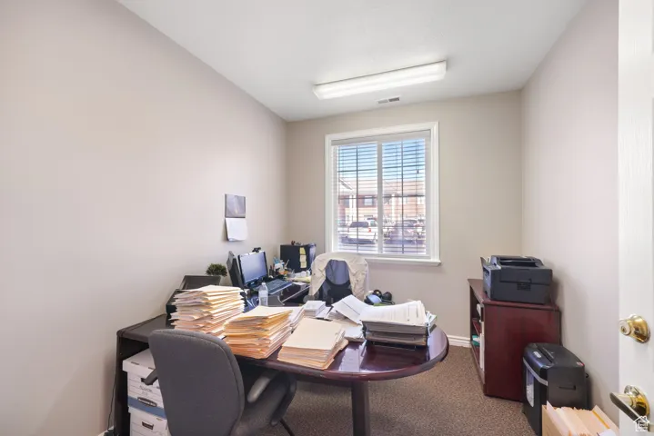 Office space featuring carpet floors