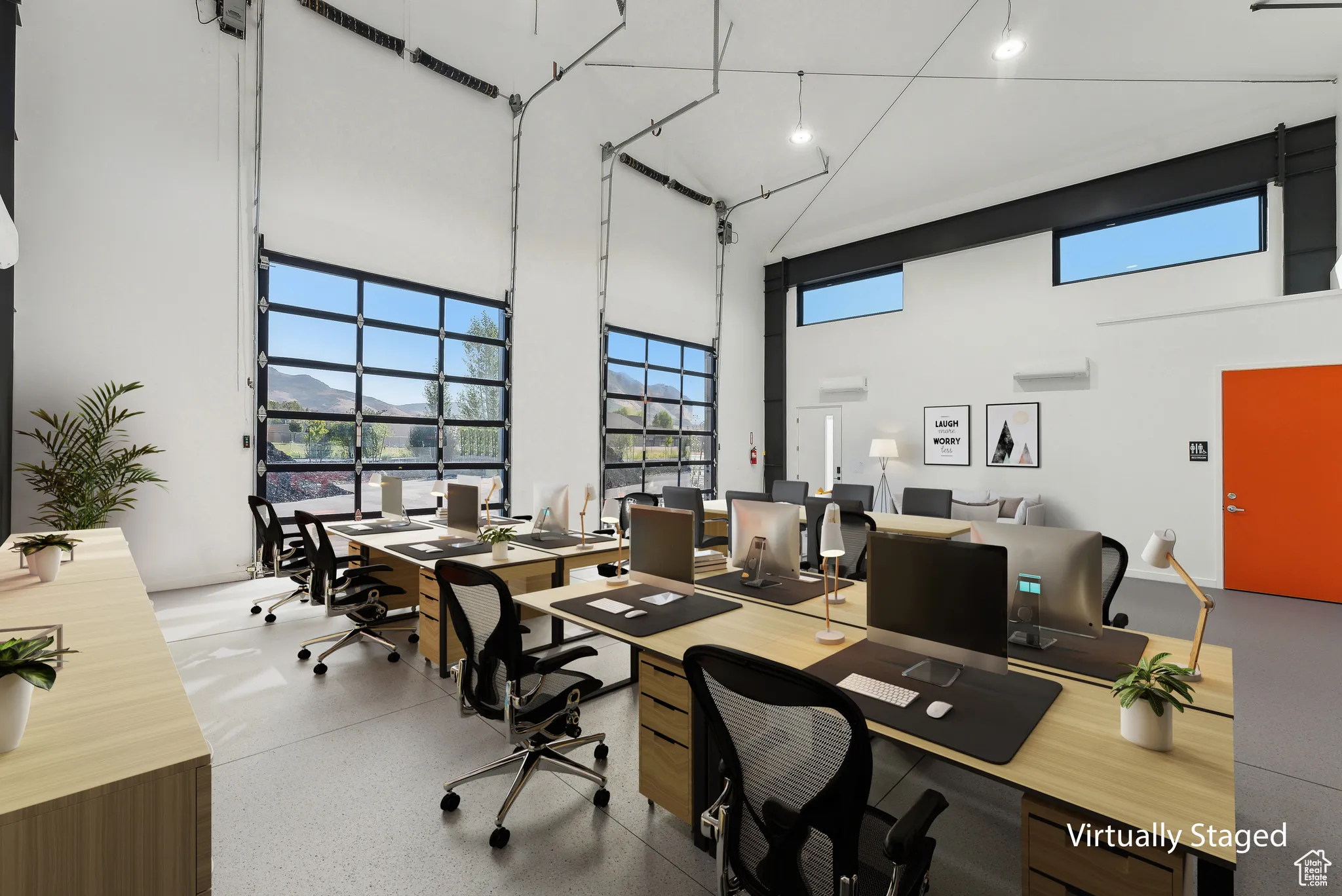 Office area featuring a towering ceiling