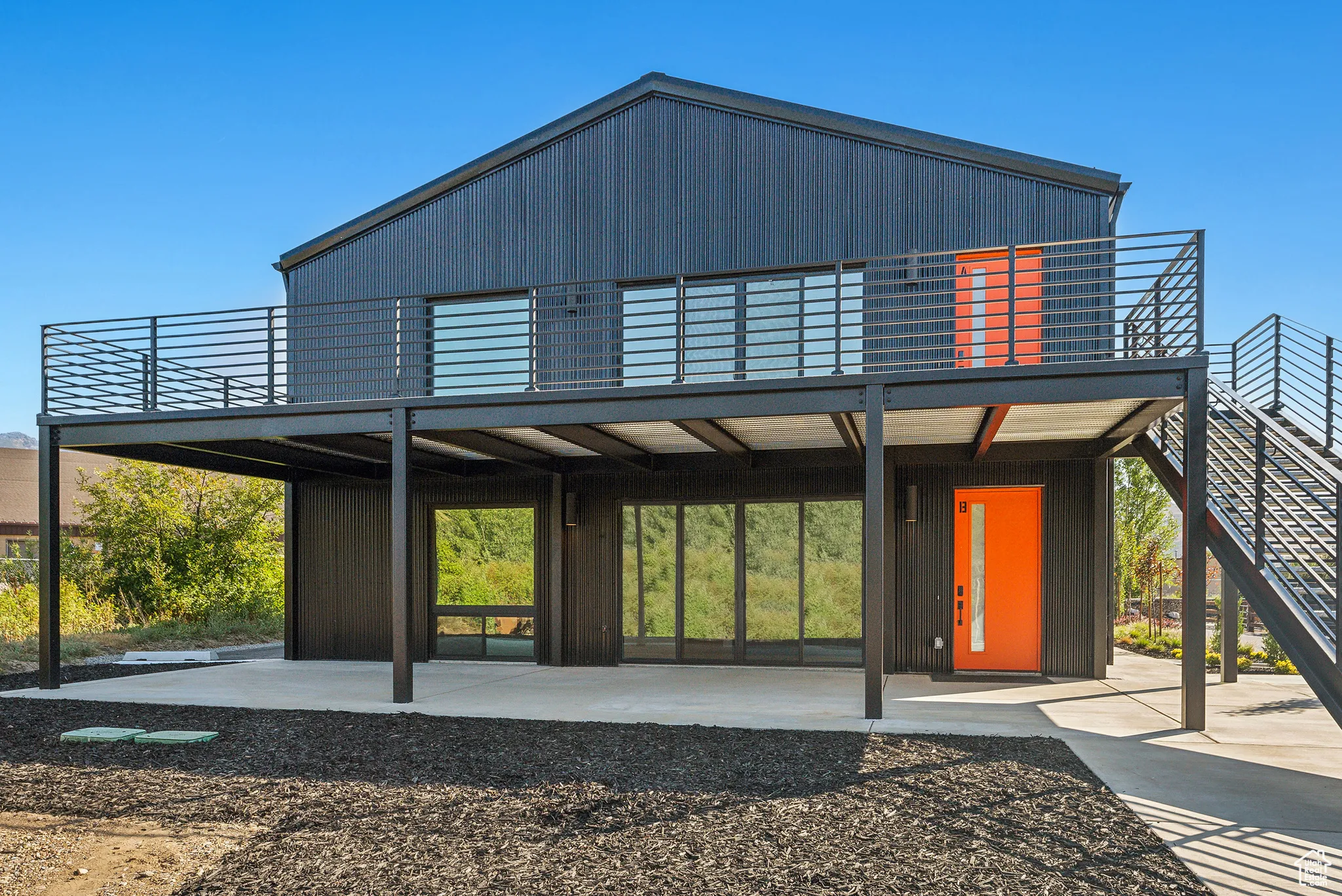 Rear view of property with a patio area