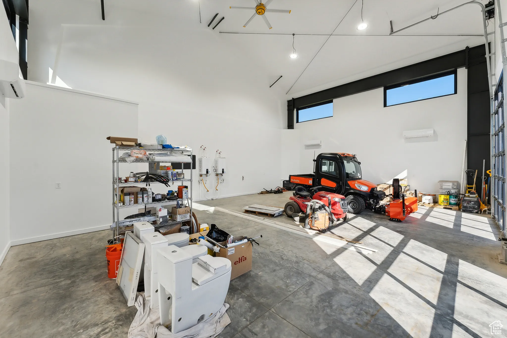 Garage featuring ceiling fan