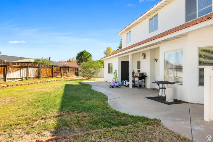 View of yard featuring a patio