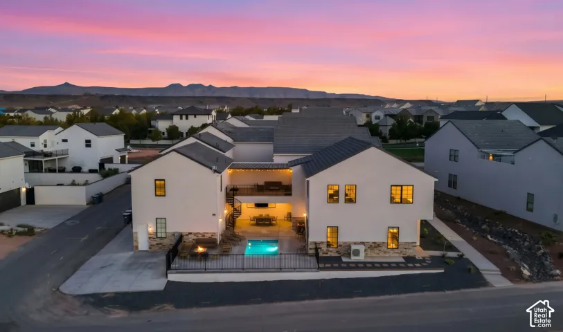 The home at dusk in Aerie Resort, zoned RR (Recreation Resort) for nightly rentals.