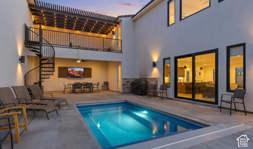 The heated pool, with the spiral staircase climbing to the upper deck.
