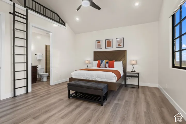 An upstairs bedroom with a built-in sleeping loft for extra guests.
