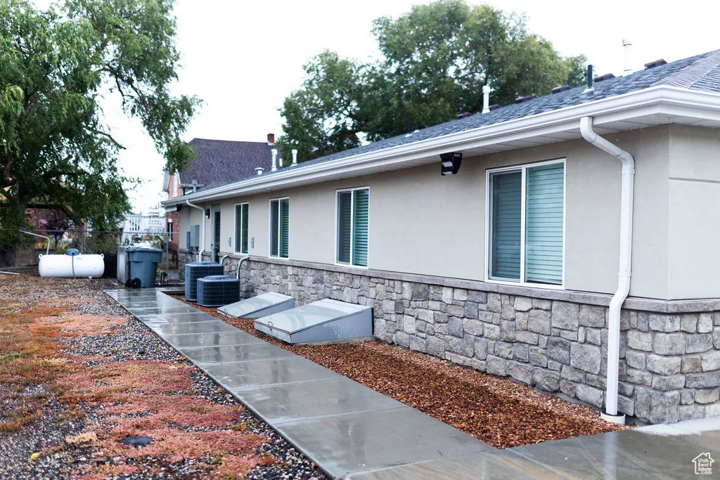 View of property exterior featuring a patio