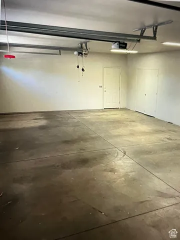 Oversized three car garage w/door opener