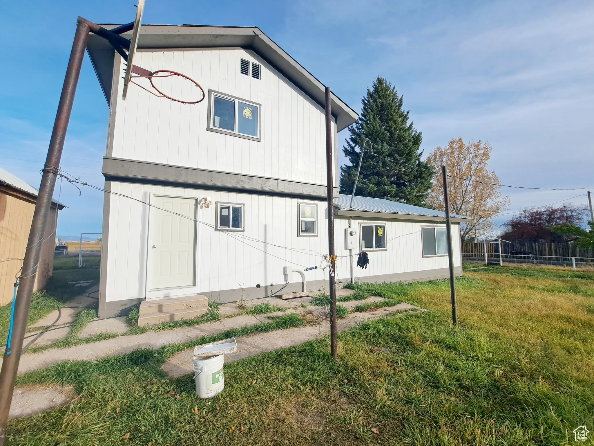 Back of house with Fenced yard