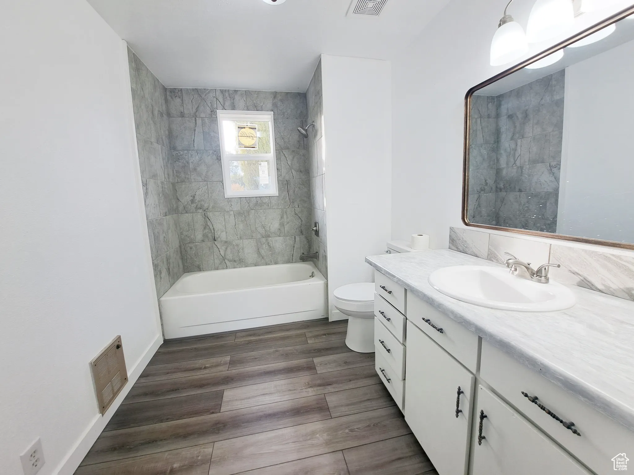 Full bathroom, New Paint, New Ceiling Fan, New tiled shower / bath, New toilet,  New vanity, New Lighting, New Countertops