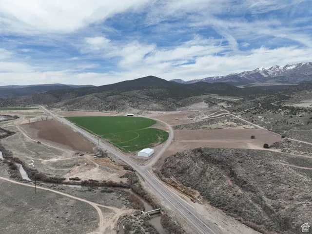 Drone / aerial view featuring a mountain view