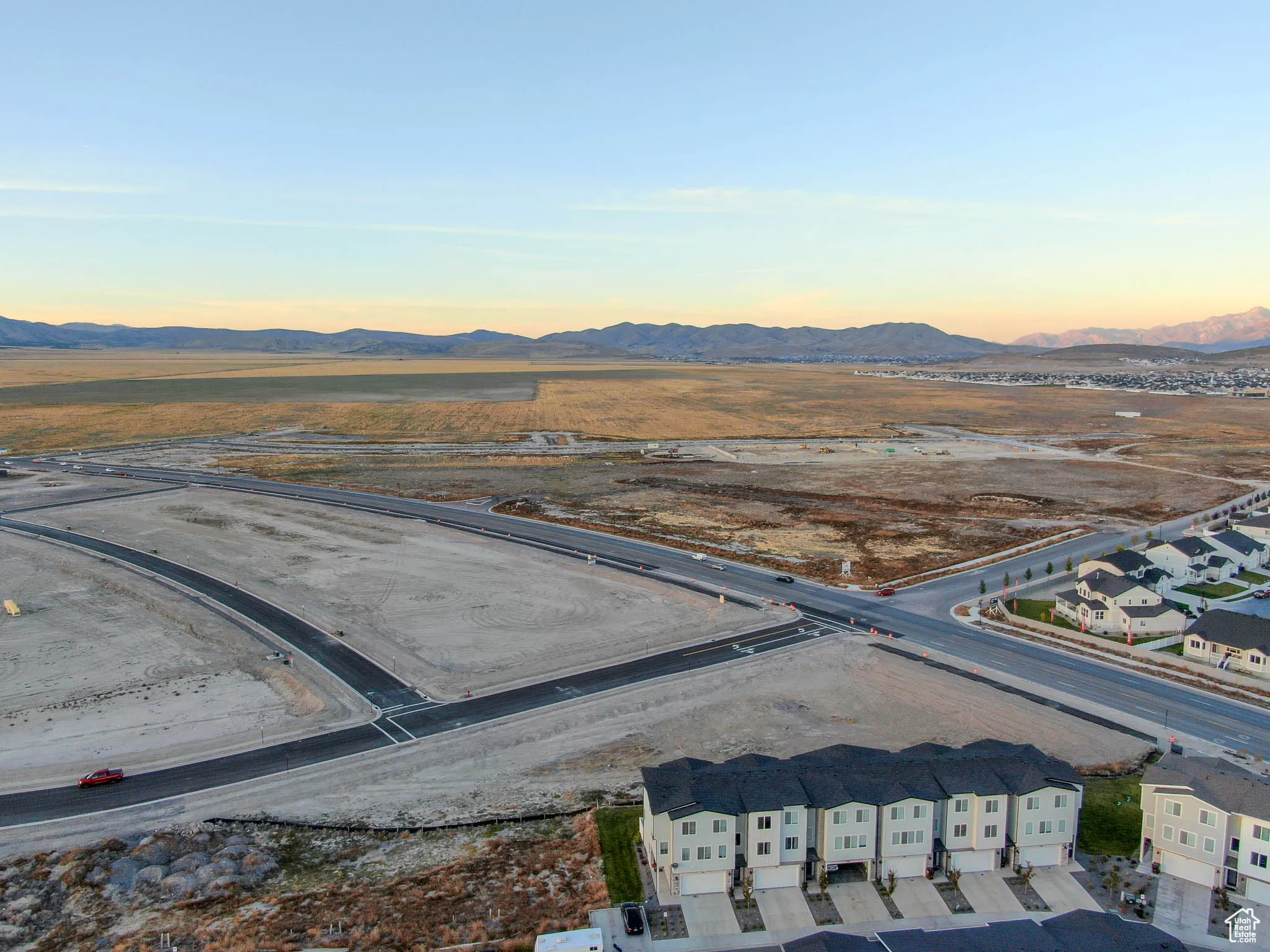 Aerial view at dusk with a mountain view
