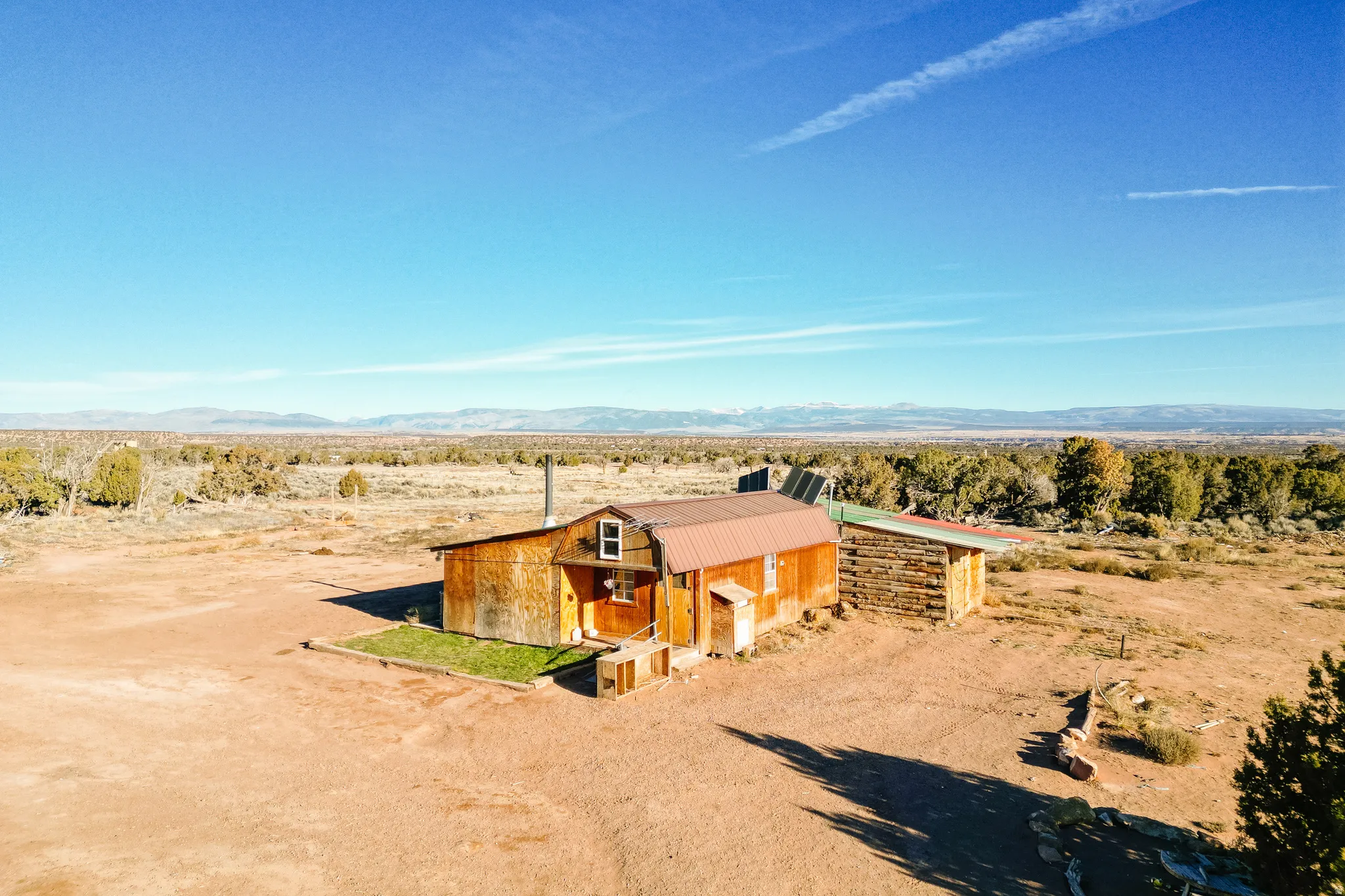View of outdoor structure with a mountain view, a desert view, and a view of countryside