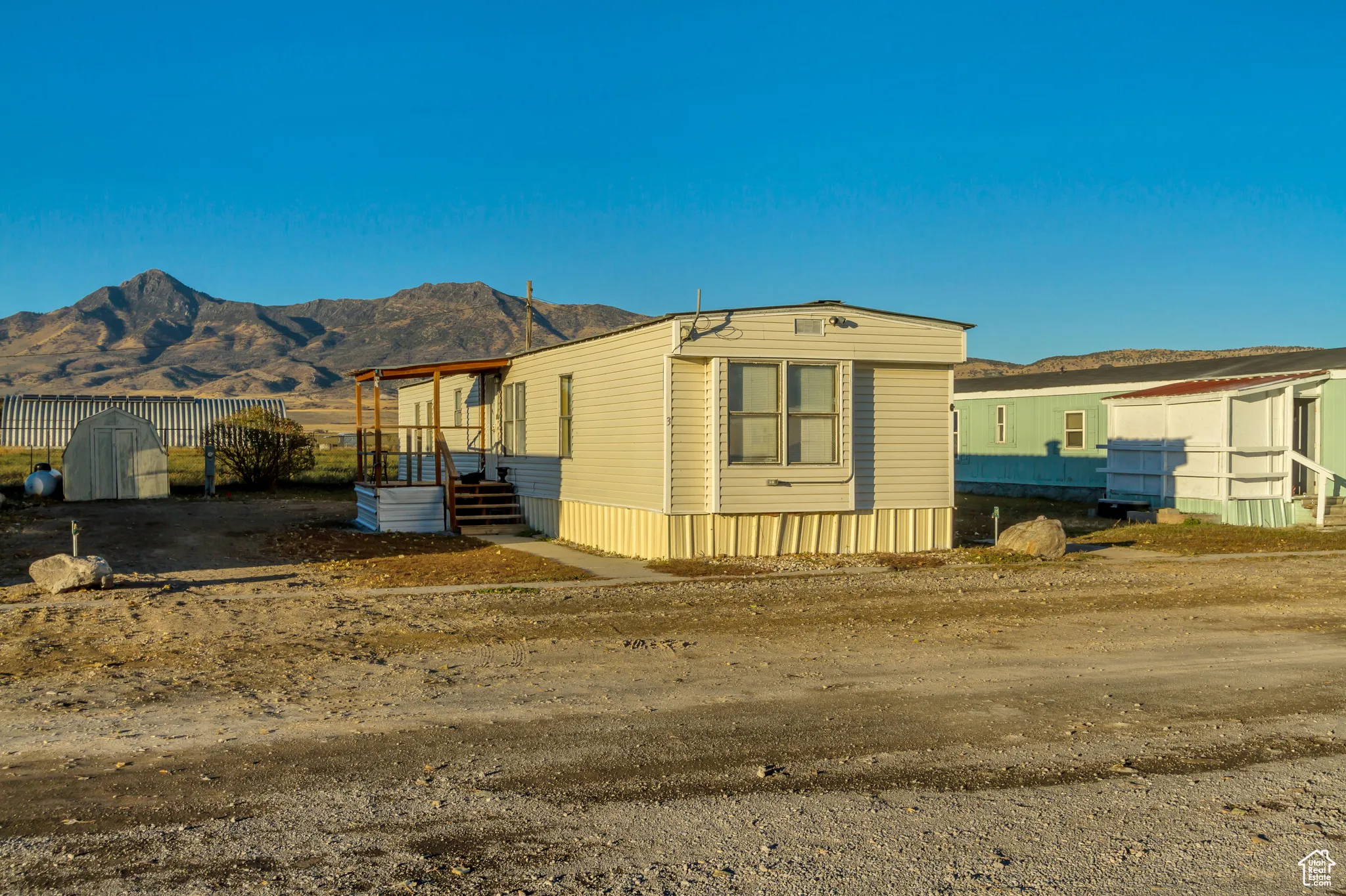 View of front of property featuring a mountain view