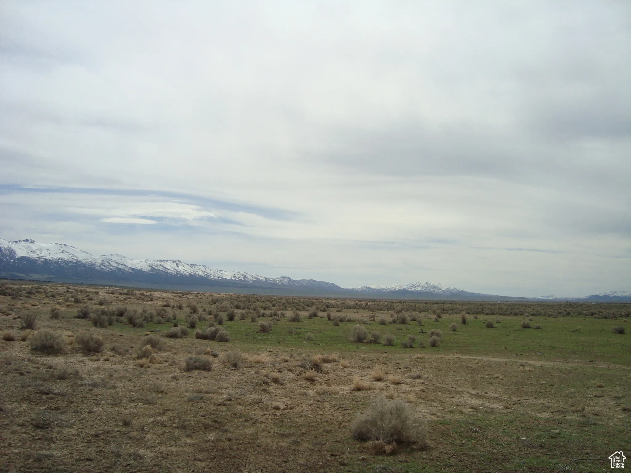 Property view of mountains featuring a rural view